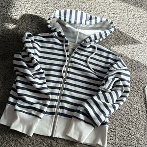 White and navy striped zip up hoodie. Universal Thread size medium.